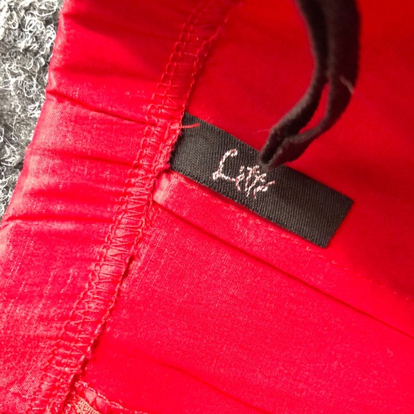 Chic Strapless Red Dress with Beaded Detail - Picture 2 of 8